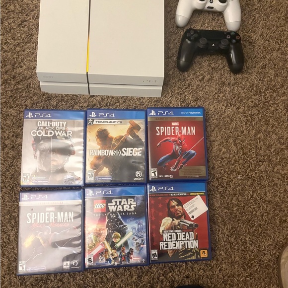 Sony PlayStation 4 Console with DualShock Controllers - White and Black
